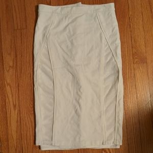 Seamed ponte knit pencil skirt with mesh inset